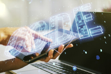 Aufkleber - Creative Code word sign and finger clicks on a digital tablet on background, international software development concept. Multiexposure