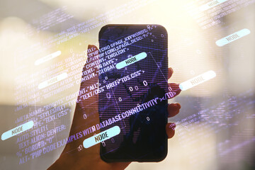 Aufkleber - Multi exposure of abstract software development hologram with world map and hand with cell phone on background, global research and analytics concept