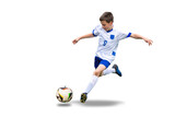 Isolated, transparent young boy kicks a soccer ball