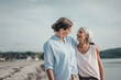 © tunedin - Mother and daughter spending a day at the sea, embracing on the beach