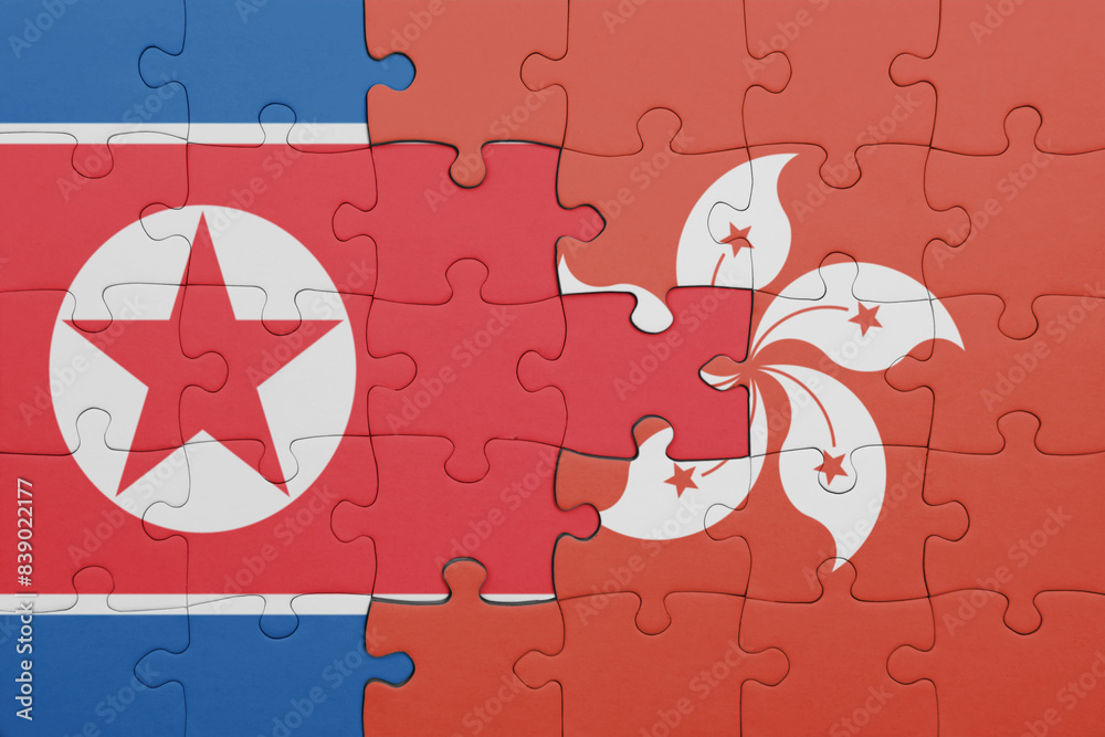 puzzle with the colourful national flag of hong kong and flag of north ...