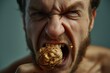 © Sparrowski - Intense Struggle and Determination, Close-Up of Man with Walnut in Mouth