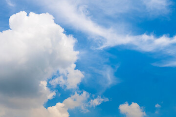 Wall Mural - Tropical summer blue sky fluffy white cloud summertime on light sunny day cloudscape. Clear bright blue skyline spring sunlight climate background. Heaven blue environment ecology high scenic nature.