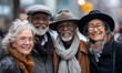 © Onchira - Happy group of senior people smiling at camera together outside - Delightful older friends enjoying day out walking on city street - Aged male and females pensioners hugging together outdoors