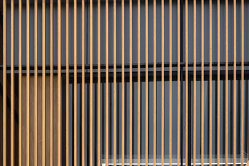 Wall Mural - The wooden slats on the window are brown and black