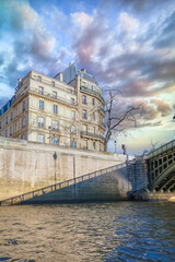 Wall Mural - Scenic view of Saint-Louis island and beautiful Sully bridge in Paris, France