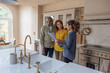 © ReeldealHD images - Senior couple looking at new home with a real estate agent