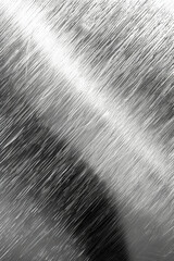 Poster - Close-up of brushed stainless steel surface showcasing the texture and pattern, perfect for industrial and architectural backgrounds.