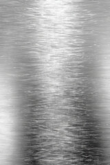 Poster - Close-up of brushed metal texture with linear patterns showcasing industrial strength and modern design, perfect for backgrounds, engineering, and decor.