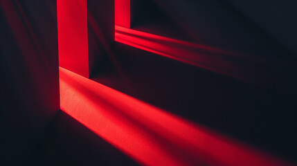 Abstract image of dramatic red light casting strong shadows through geometric shapes, creating a striking and mysterious visual effect.