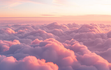 Sticker - A breathtaking view of fluffy clouds at sunrise, bathed in soft pastel hues of pink and orange, creating a peaceful and serene atmosphere in the sky.