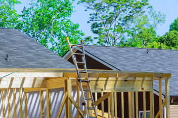 Wall Mural - Building house using unfinished timber framing during remodeling