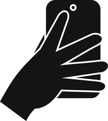 Poster - Silhouette of a human hand holding a smartphone taking a picture