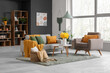 © Pixel-Shot - Grey sofa, armchair, plaid and coffee table in stylish living room