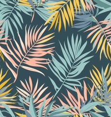 Tropical leaves and palm fronds in pastel colors, arranged to create an abstract pattern on dark teal background seamless repeating texture pattern