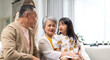 © Art_Photo - Portrait of happy love family asian father and mother playing with adorable asian kid girl.daughter, care, insurance.Happy family moments good time love with grandparents.Love of big family