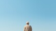© Media Srock - An elderly man stands on a pier with a cane in his hand. He looks out at the water, possibly lost in thought. Concept of solitude and contemplation, as the man stands alone in a peaceful setting