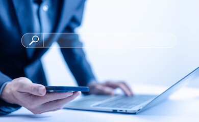 Wall Mural - businessman search bar from a smartphone. concept of keyword search engines, web browser information