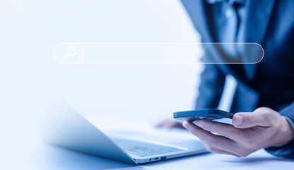 Wall Mural - businessman search bar from a smartphone. concept of keyword search engines, web browser information