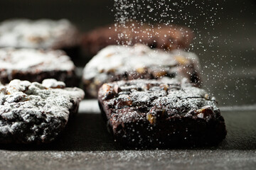 Wall Mural - Chocolate brownies on a dark background	