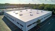 © visoot - Seamless white PVC commercial flat roof of factory, summer day. Aerial high view. Generative AI.