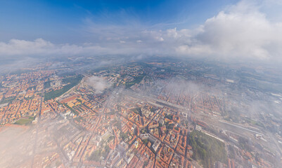 Wall Mural - Bologna, Italy. Historical Center. Panorama of the city on a summer day. Flying in the clouds. Aerial view