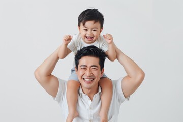 This cute little boy is riding his father's throat, while we are all happy to see them on a white isolated background.