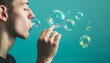 © Paulius - Capturing the Magic: Young Man Blowing Soap Bubbles in Close-Up Side View Shot