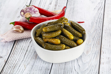 Sticker - Marinated small cucumbers in the bowl