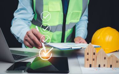 Architect or engineer Checking the list of documents and approving the project, Approved Buildings Permit concept with approved residential building project, Construction project inspection.