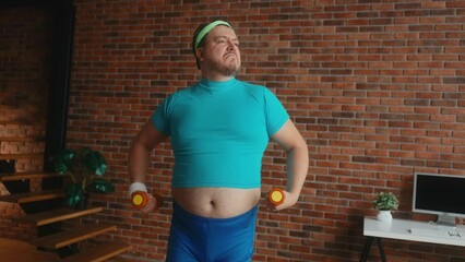 Wall Mural - Funny fat man posing with sport dumbbells at home