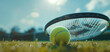 © ink drop - Close up of a tennis ball and racket on a grass tennis court