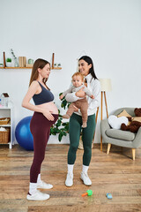 Wall Mural - A young beautiful mother is tenderly holding her baby while standing next to her coach at a parents course, receiving guidance and support.