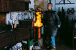 © ADDICTIVE STOCK - Blacksmith working with molten metal in forge