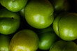 © ADDICTIVE STOCK - Organic green plums close-up, a staple in Eastern cuisine