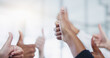 © AchillesReel/peopleimages.com - Hands, team and thumbs up gesture for yes with positive businesspeople with goal, unity and thank you. Collaboration, good news and diversity with winner for group bonding with agreement in America.