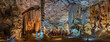 © robertharding - View of visitors viewing stalagmites and stalactites in the interior of Cango Caves, Oudtshoorn, Western Cape