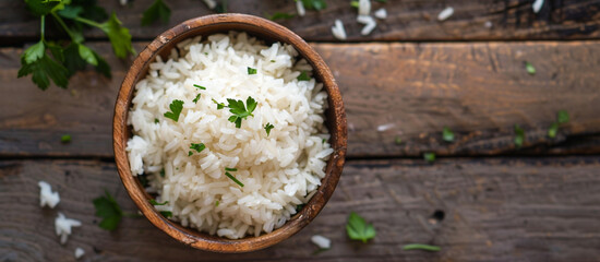 cooked rice in a bowl on wooden floor