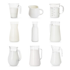 Wall Mural - Fresh milk in jugs isolated on white, set