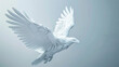 © Thinnawat - A stunning white sculpture of an eagle in flight, with detailed wings spread, captured against a soft blue background.