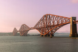The iconic Forth Bridge, a cantilever railway bridge, spans the Firth of Forth west of central Edinburgh. Completed in 1890, it is a UNESCO World Heritage Site.