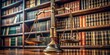 © rattinan - Scales of Justice resting on a shelf surrounded by law books in a library , law, judiciary, jurisprudence, justice, scales, books, legal, judgment, court, balance, legal system, gavel