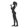 © NikahGeh - Silhouette of a woman brushing teeth, side profile, morning routine.