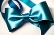 © Matan - Teal bow ribbon band satin blue stripe fabric (isolated on white background with clipping path) for holiday gift box, wedding greeting card banner, present wrap design decoration ornament