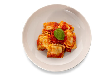 Wall Mural - Ravioli with tomato sauce and basil leaf in white plate isolated, top view