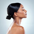 © CoetzeeRising/peopleimages.com - Skincare, woman and face in side view for beauty, hygiene and facial treatment in studio. Dermatology, female person and natural glow from cosmetics or collagen for wellness with white background
