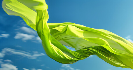 Poster -  flying lime colored fabric against a blue sky,
