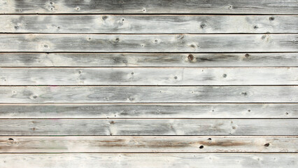Poster - A wooden board with a grainy texture and a few holes. The board is white and has a rustic feel to it