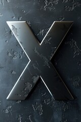 Poster - A close-up shot of a metal letter X on a dark, black background