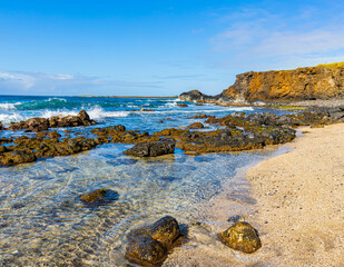 Wall Mural - Tide Pools and Exposed Lava Reef Below Sea Cliffs on Glass Beach, Port Allen, Kauai, Hawaii, USA